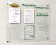 Стенд «Информация» из закаленного стекла 900 х 800 мм на 4-х дистанционных держателях, 5 карманов А4 из акрила с прозрачным скотчем. Стоимость 8020 рублей.